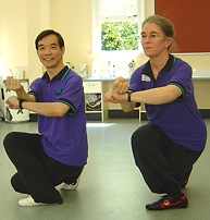 Dr Lam practicing with Dr Stephanie Taylor from Monterey, CA USA during the Jan 04 tai chi workshop