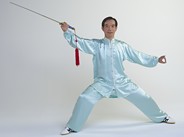 Dr Lam playing tai chi sword