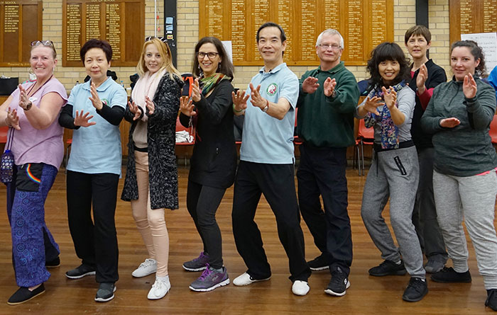 Hillary Simon, Physiotherapist and Certified Tai Chi for Health Instructor (center) next to Dr Paul Lam 